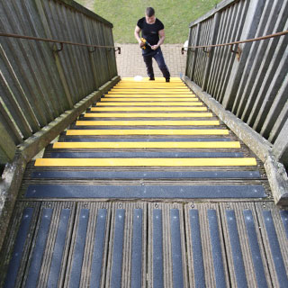 DDA compliant yellow nosings highlight the step edges. DDA compliant yellow nosings highlight the step edges.
