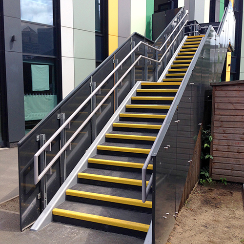 Anti-Slip Stair Treads cover existing school stairs, on high footfall areas and heavily worn steps. Anti-Slip Stair Treads cover existing school stairs, on high footfall areas and heavily worn steps.