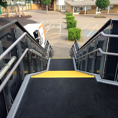 Completed stairs, ramps and walkways for a school installation. Completed stairs, ramps and walkways for a school installation.