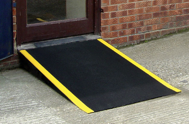 Floor sheets provide a non-slip area for a door threshold ramp. Floor sheets provide a non-slip area for a door threshold ramp.