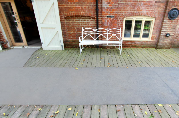 GRP floor sheets on slippery wooden decking areas at Snape Maltings. GRP floor sheets on slippery wooden decking areas at Snape Maltings.