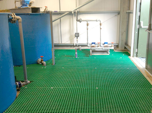 GRP Grating industrial tank room floor installation. GRP Grating industrial tank room floor installation.