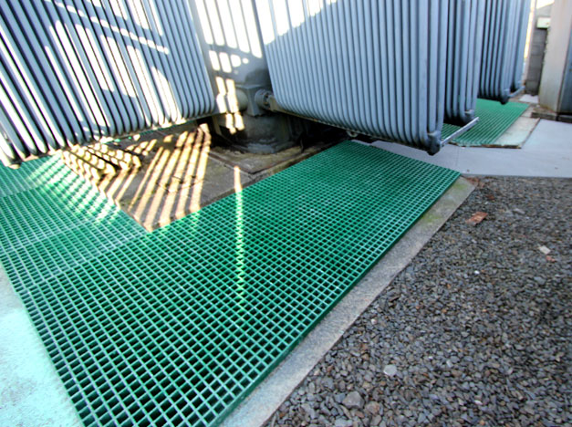 Generator transformer walkway area with open mesh industrial GRP Grating. Generator transformer walkway area with open mesh industrial GRP Grating.