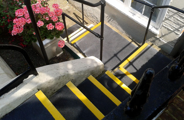 Basement flat entrance made safer with non-slip stair treads and landing covers. Basement flat entrance made safer with non-slip stair treads and landing covers.