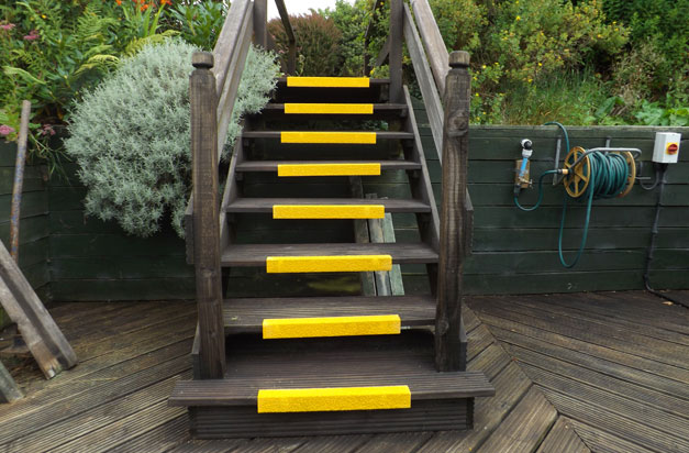 Anti-Slip Stair Nosings - rated extremely low potential for slip. Anti slip stair nosings timber wooden stairway installation.