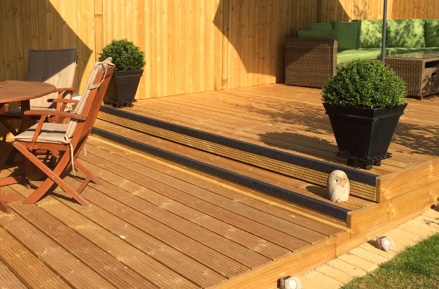 Stair nosings protect as well as highlight garden decking steps. Stair nosings protect as well as highlight garden decking steps.