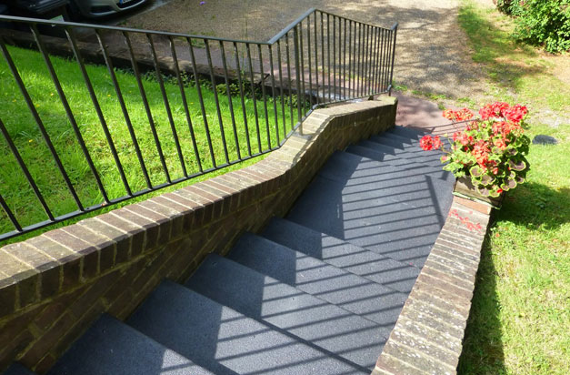 Garden stairs with one-colour black anti slip stair treads. Garden stairs with one-colour black anti slip stair treads.
